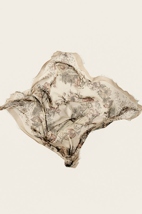 Detail shot of the Max Mara Sartoriale Oversized Scarf in camel-colour printed silk, with fringed trim on the edges.